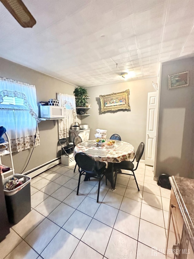 44 S Ward St, New Brunswick, NJ 08901 - dining room with baseboard heating and light tile patterned floors