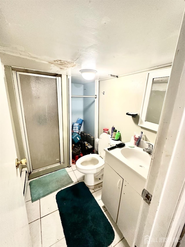 44 S Ward St, New Brunswick, NJ 08901 - bathroom featuring vanity, a shower stall, and tile patterned floors