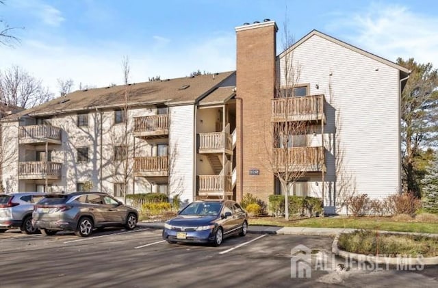 403 Ravens Crest Dr, Plainsboro, NJ 08536 - view of apartment building / complex with uncovered parking