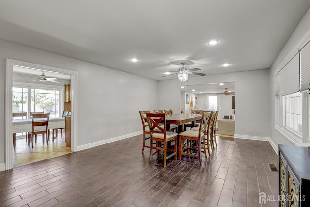 dining room featuring recessed lighting, baseboards, ceiling fan, and dark wood-style flooring