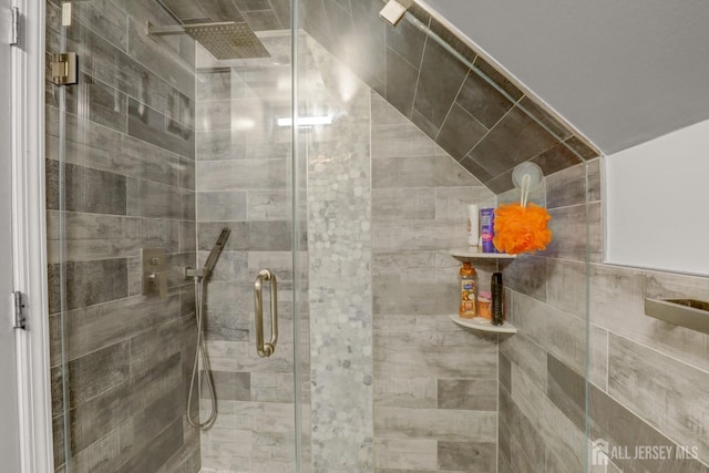 full bathroom with a shower stall