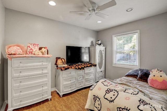 bedroom featuring recessed lighting, light wood-type flooring, and a ceiling fan