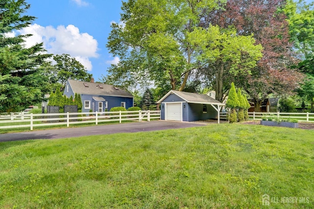 10 Shaw Dr, Franklin, NJ 08528 - view of yard with a garage, driveway, and an outdoor structure