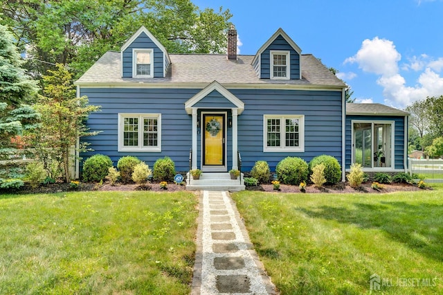 10 Shaw Dr, Franklin, NJ 08528 - new england style home with a chimney, a front lawn, and a shingled roof