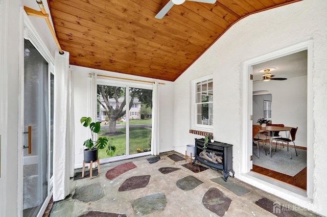 10 Shaw Dr, Franklin, NJ 08528 - sunroom featuring lofted ceiling, a wood stove, and arched walkways