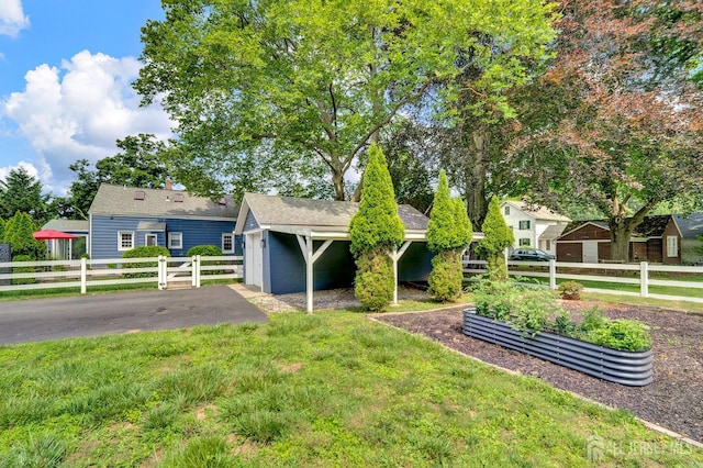 10 Shaw Dr, Franklin, NJ 08528 - view of front of home with a vegetable garden