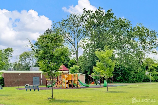 10 Shaw Dr, Franklin, NJ 08528 - community jungle gym featuring a lawn