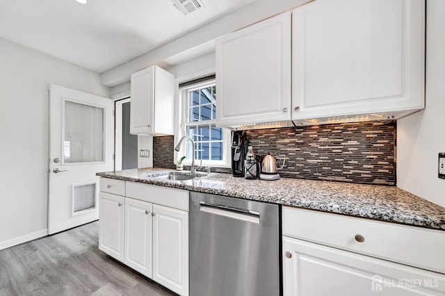 10 Shaw Dr, Franklin, NJ 08528 - kitchen with dishwasher, light wood-type flooring, light stone countertops, and white cabinets