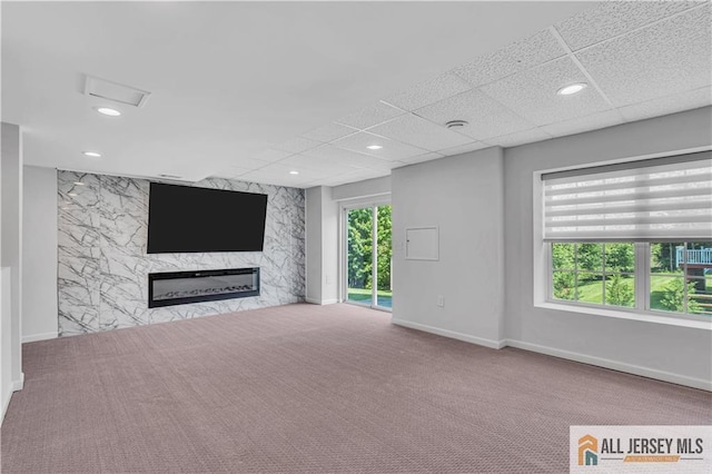 11 Hawk Ct, East Brunswick, NJ 08816 - unfurnished living room with a premium fireplace, carpet floors, recessed lighting, and a drop ceiling