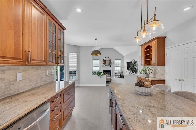 11 Hawk Ct, East Brunswick, NJ 08816 - kitchen featuring stainless steel dishwasher, open floor plan, light stone counters, brown cabinets, and recessed lighting