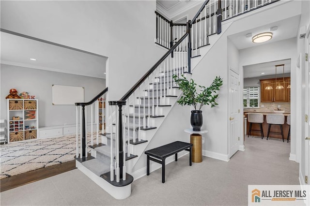 11 Hawk Ct, East Brunswick, NJ 08816 - stairway featuring ornamental molding and a high ceiling