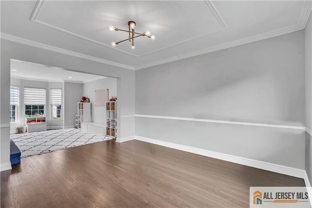 11 Hawk Ct, East Brunswick, NJ 08816 - unfurnished living room with wood finished floors, a chandelier, and ornamental molding