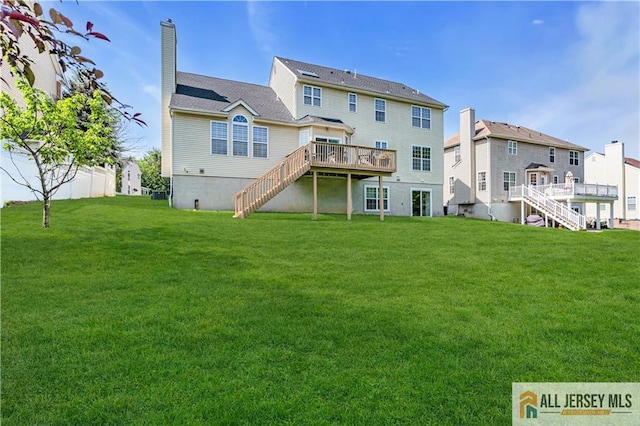 11 Hawk Ct, East Brunswick, NJ 08816 - rear view of house featuring stairs, a wooden deck, a chimney, and a yard