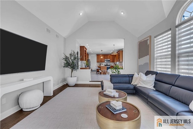 11 Hawk Ct, East Brunswick, NJ 08816 - living room with lofted ceiling, dark wood-type flooring, and recessed lighting