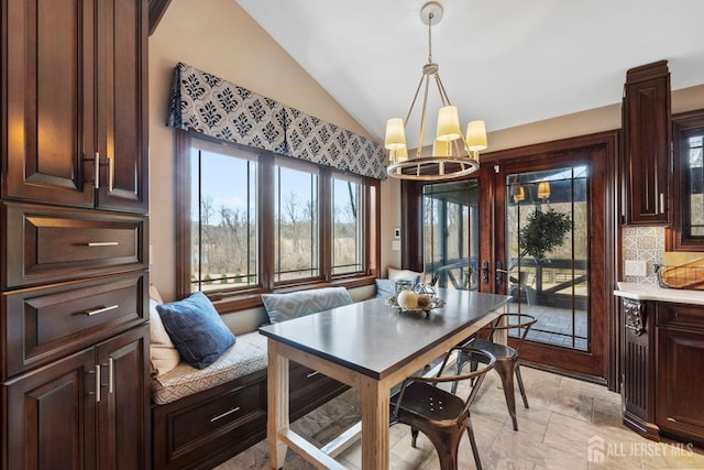 13 Eagle Nest Rd, Colts Neck, NJ 07722 - dining room featuring vaulted ceiling and a chandelier