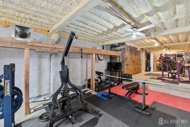 exercise area with a ceiling fan