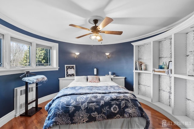 13 Eagle Nest Rd, Colts Neck, NJ 07722 - bedroom with crown molding, radiator, wood finished floors, and ceiling fan
