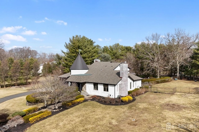 13 Eagle Nest Rd, Colts Neck, NJ 07722 - view of property exterior with a chimney, view of scattered trees, and roof with shingles
