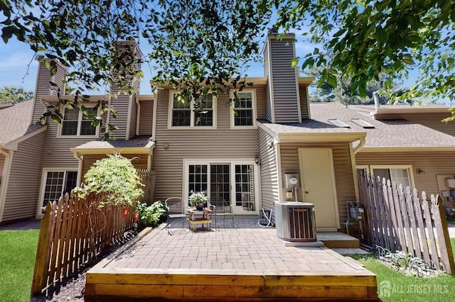 1406 Locust Ct, South Brunswick, NJ 08852 - rear view of property with a chimney, a patio area, and a shingled roof
