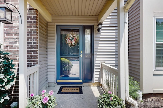 1406 Locust Ct, South Brunswick, NJ 08852 - view of exterior entry featuring a porch and brick siding