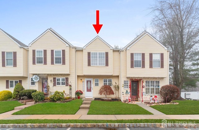 view of property with a front yard