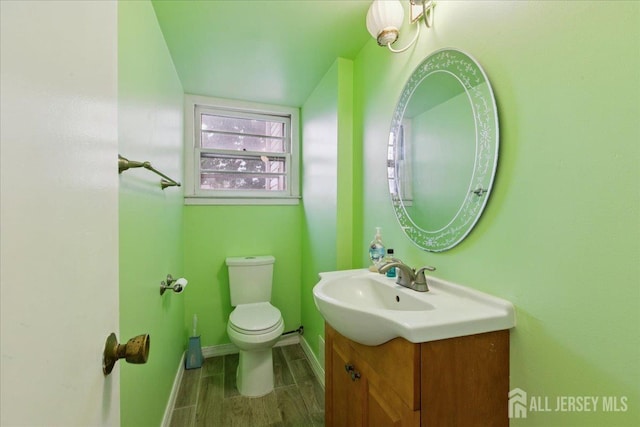 796 Curie Rd, North Brunswick, NJ 08902 - half bathroom featuring vanity and toilet