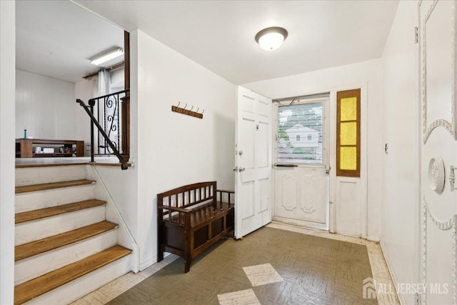 796 Curie Rd, North Brunswick, NJ 08902 - foyer featuring stairway and baseboards