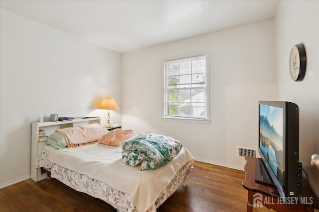 796 Curie Rd, North Brunswick, NJ 08902 - bedroom featuring wood finished floors and baseboards