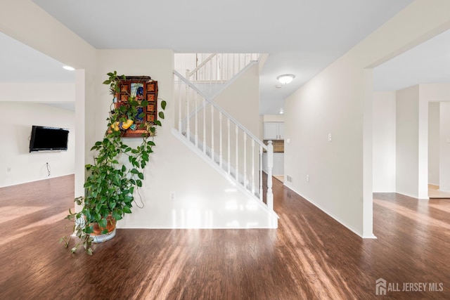 96 Lark Dr, South River, NJ 08882 - unfurnished living room with wood finished floors and stairs