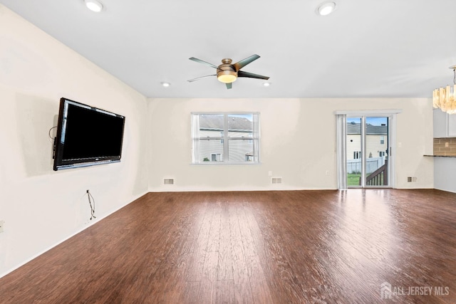 96 Lark Dr, South River, NJ 08882 - unfurnished living room with plenty of natural light, wood finished floors, a ceiling fan, and recessed lighting