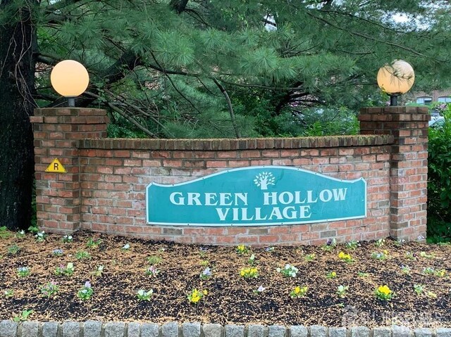 view of community sign