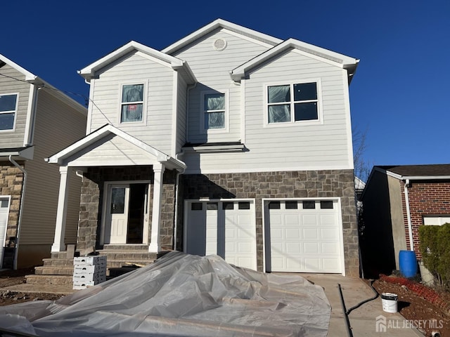 view of front of property featuring a garage