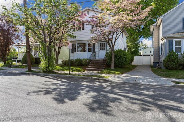 view of front of property with fence