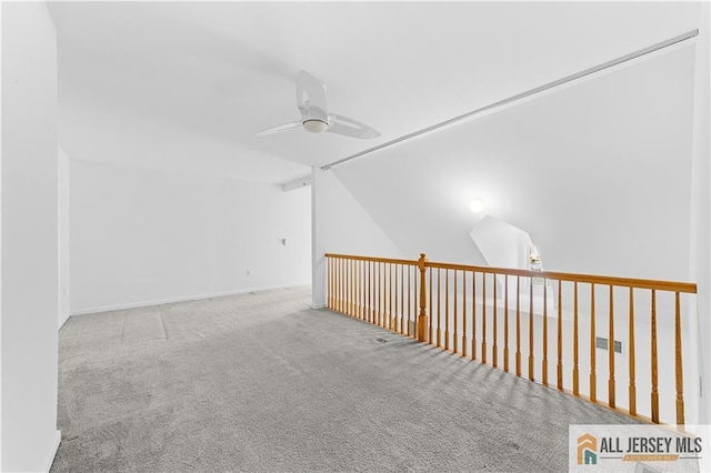 1177 Morning Glory Dr Unit 1177, Monroe, NJ 08831 - carpeted empty room with a ceiling fan and vaulted ceiling