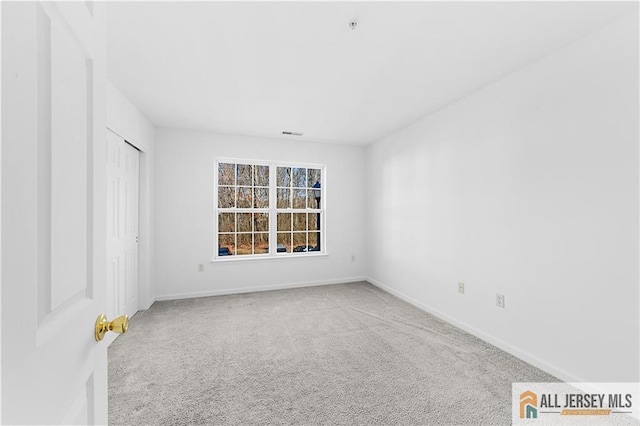 1177 Morning Glory Dr Unit 1177, Monroe, NJ 08831 - unfurnished bedroom featuring carpet floors, baseboards, and a closet