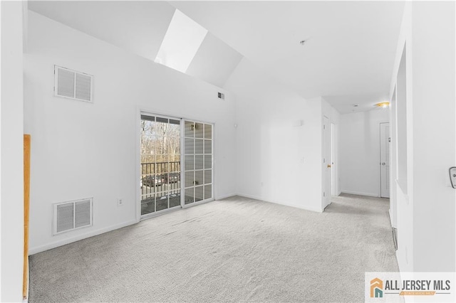 1177 Morning Glory Dr Unit 1177, Monroe, NJ 08831 - carpeted empty room with vaulted ceiling