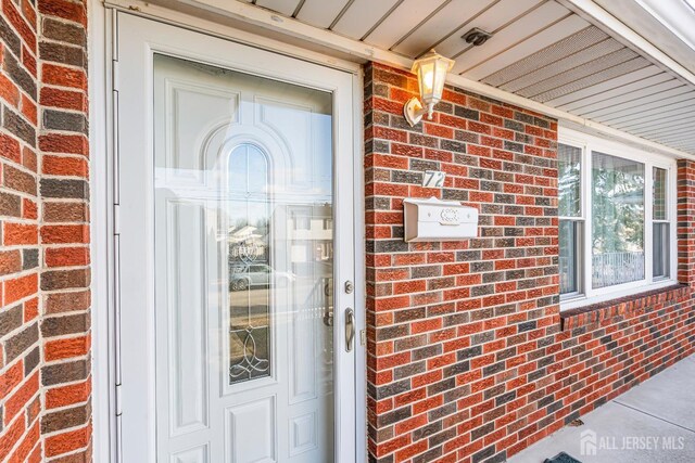 72-74 Sabo St, Carteret, NJ 07008 - property entrance featuring brick siding