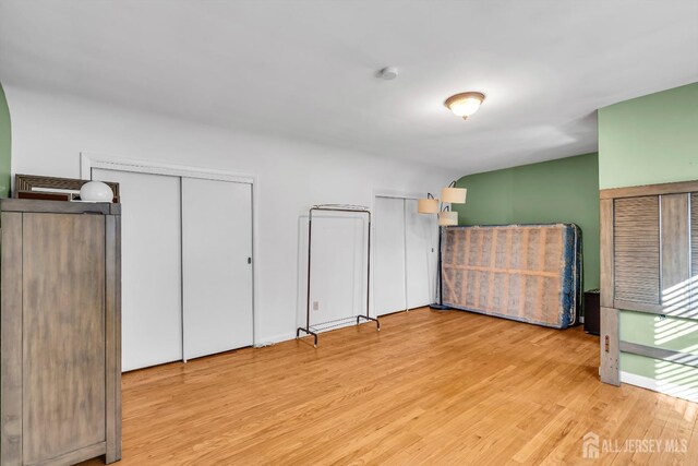 unfurnished bedroom featuring light hardwood / wood-style flooring