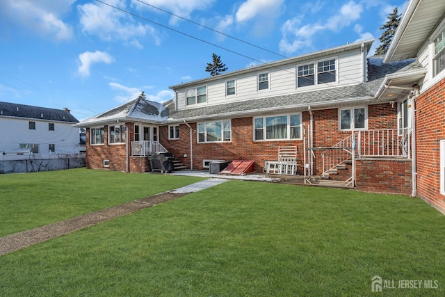 72-74 Sabo St, Carteret, NJ 07008 - back of house with brick siding and roof with shingles