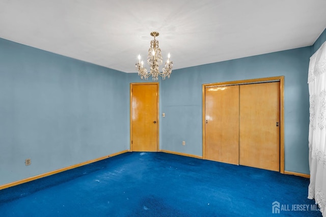 72-74 Sabo St, Carteret, NJ 07008 - unfurnished bedroom with a chandelier, baseboards, and carpet floors