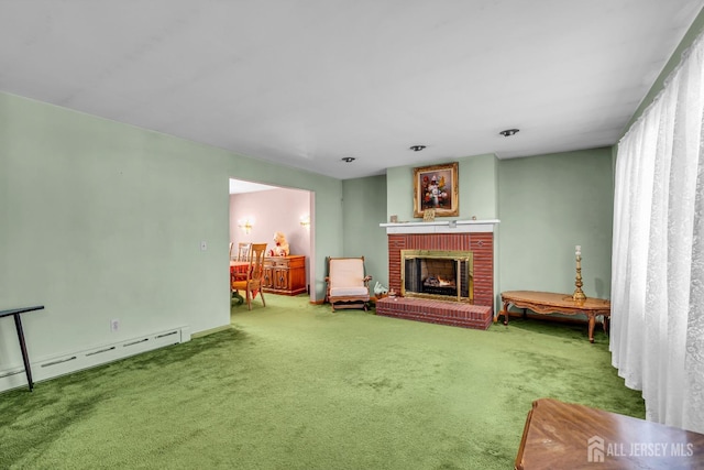 living area featuring baseboard heating, a fireplace, and carpet floors