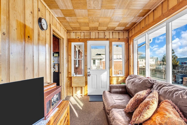 72-74 Sabo St, Carteret, NJ 07008 - living area featuring wooden walls, carpet floors, and wood ceiling