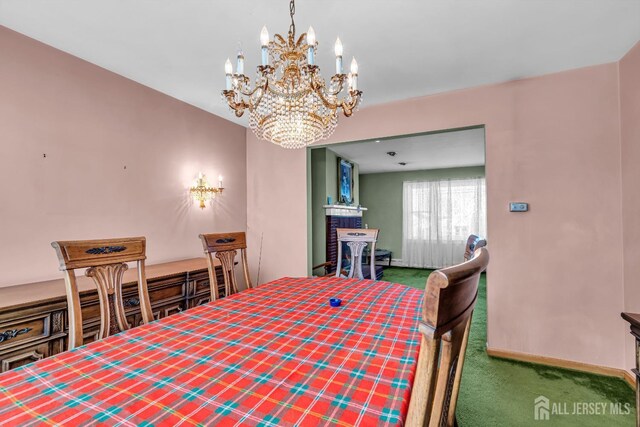 view of carpeted dining space