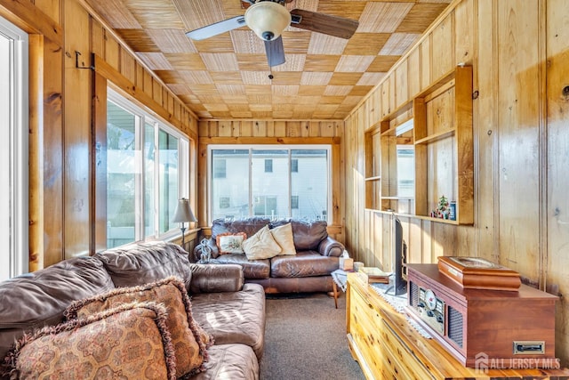 72-74 Sabo St, Carteret, NJ 07008 - sunroom / solarium with wood walls, plenty of natural light, and carpet floors