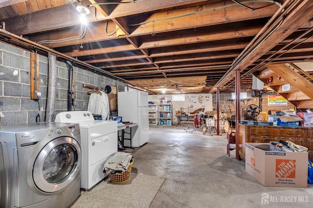 72-74 Sabo St, Carteret, NJ 07008 - below grade area featuring freestanding refrigerator and washer and dryer