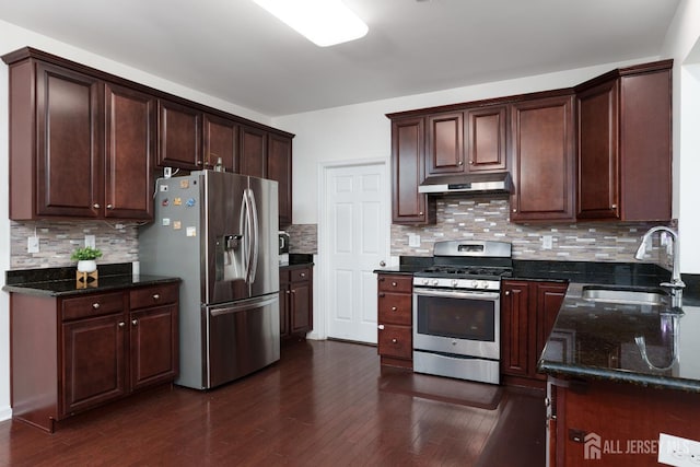 1 Elmcrest Ct E, Monroe, NJ 08831 - kitchen with stainless steel appliances, under cabinet range hood, dark wood finished floors, and tasteful backsplash