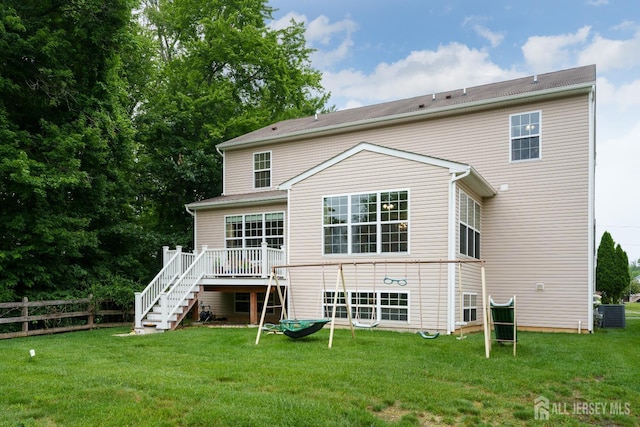 1 Elmcrest Ct E, Monroe, NJ 08831 - rear view of house with stairway and a deck