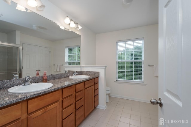 1 Elmcrest Ct E, Monroe, NJ 08831 - full bath with tile patterned flooring, double vanity, and an enclosed shower