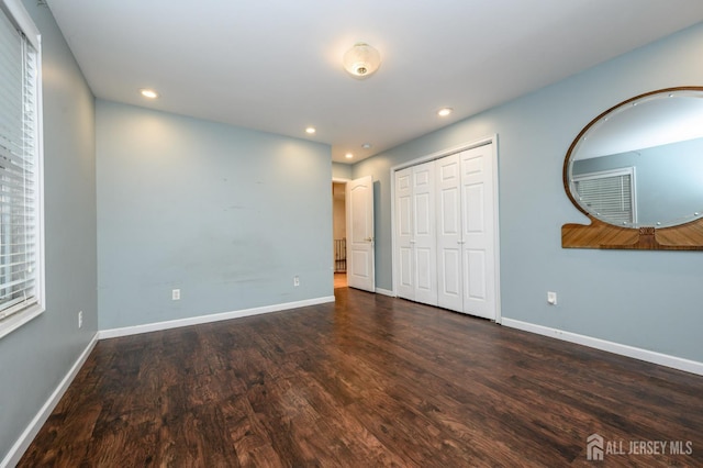 4 Ashwood Pl, North Brunswick, NJ 08902 - unfurnished bedroom featuring wood finished floors, recessed lighting, baseboards, and a closet