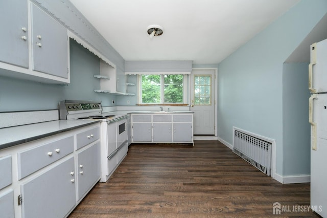 4 Ashwood Pl, North Brunswick, NJ 08902 - kitchen with white appliances, radiator, dark wood-style floors, light countertops, and open shelves